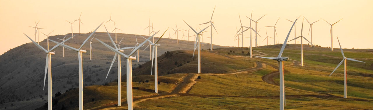 Wind farm landscape at sunset featuring Zafety Lug Lock Turbine applications